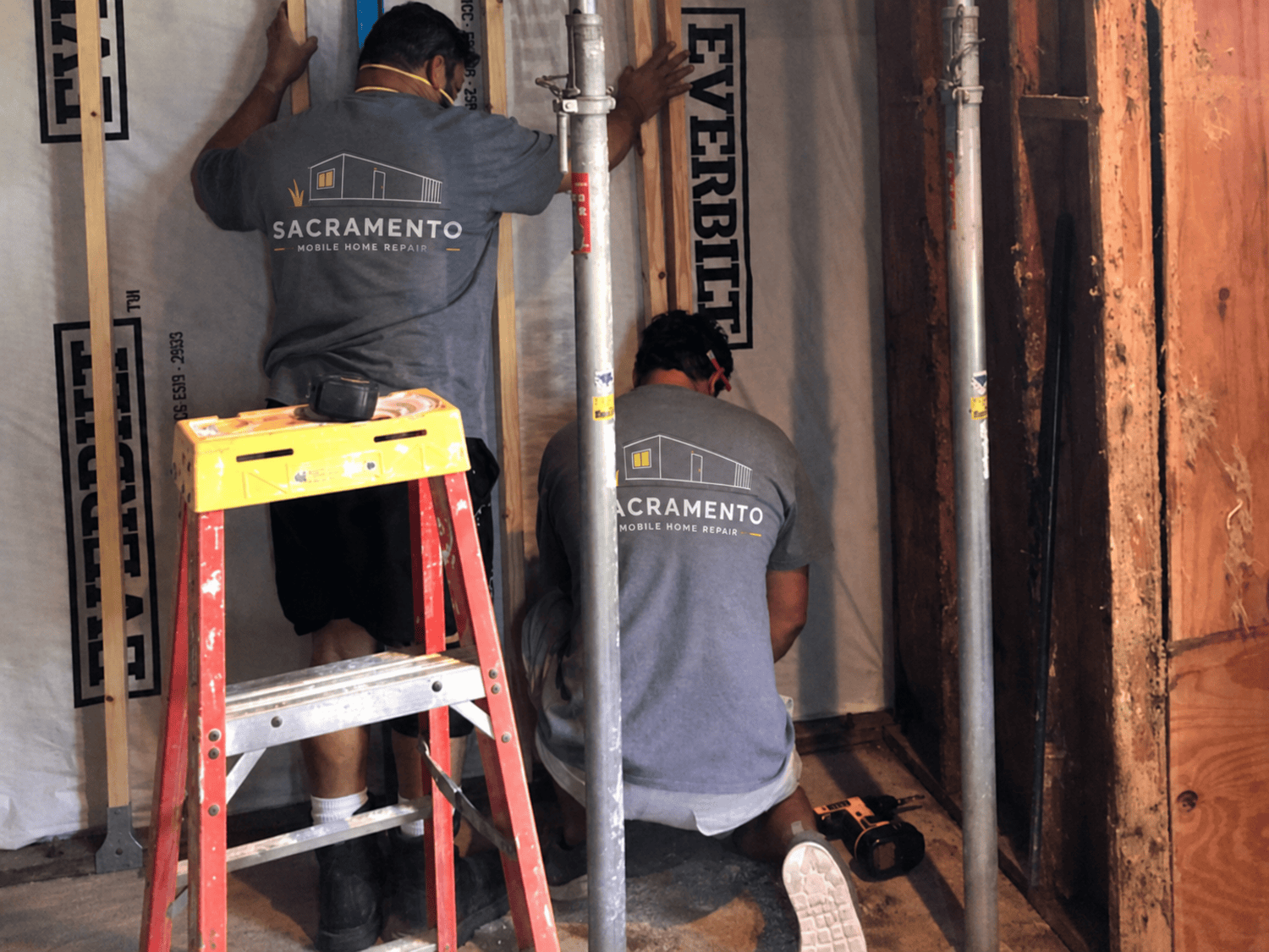 Sacramento Mobile Home Repair crew making structural wall repairs inside a manufactured home